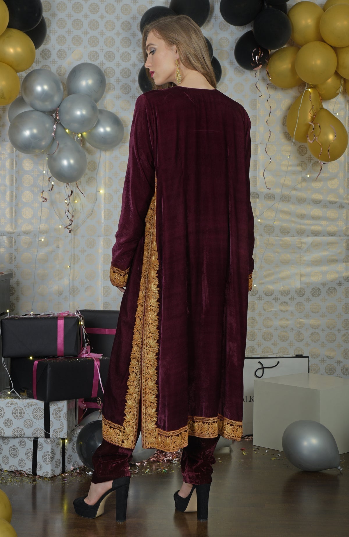Burgundy velvet kurta set with gold tilla embroidery.