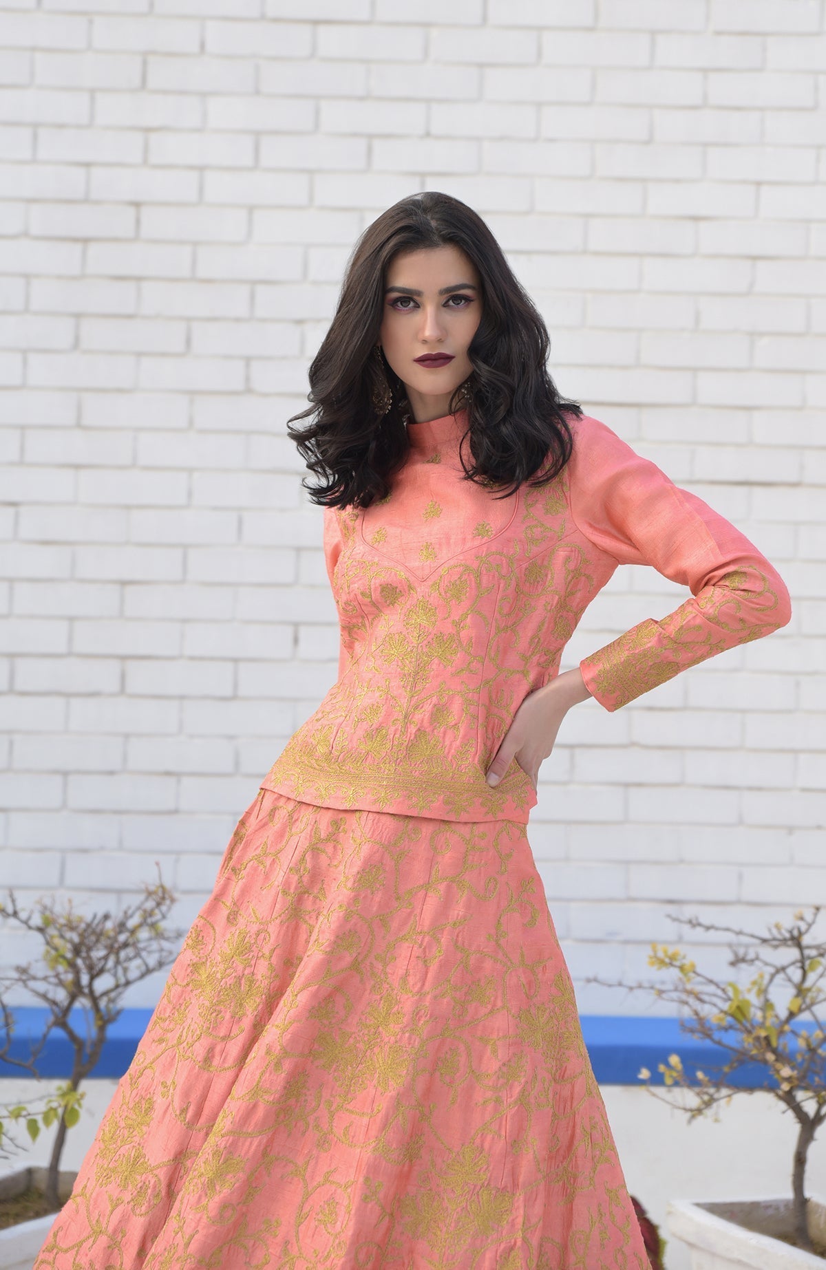 Peach Echo Kashmiri Chinar Tilla Embroidered Lehenga Set with gold embroidery.