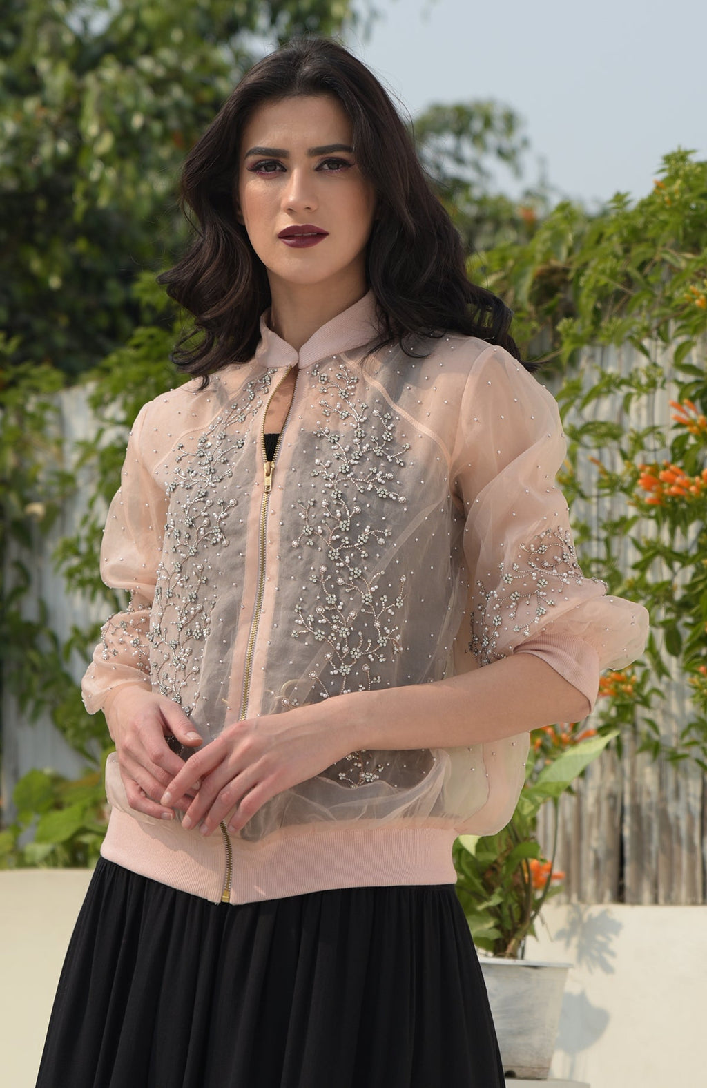 Peach organza bomber jacket with crystal floweret hand embroidery.