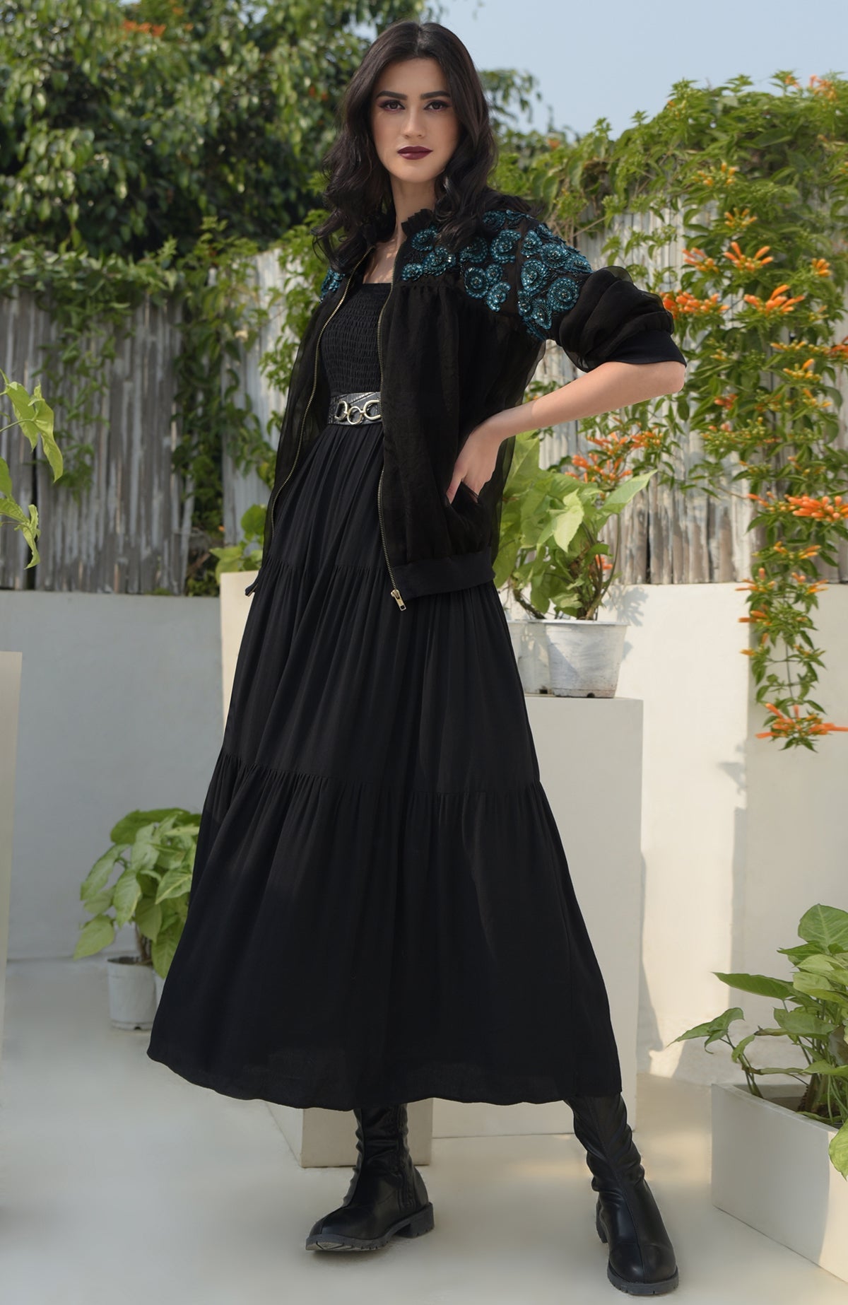 Black organza bomber jacket with blue 3D floral hand embroidery and ribbed cuffs and hem