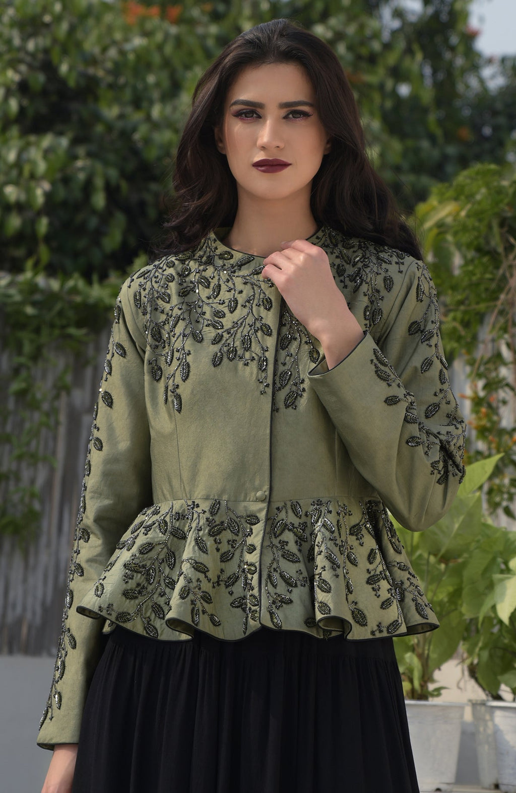 Dark foliage sequin hand embroidered structured peplum jacket.