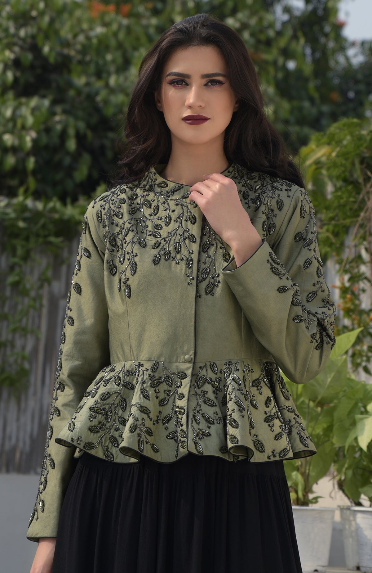 Dark foliage sequin hand embroidered structured peplum jacket.