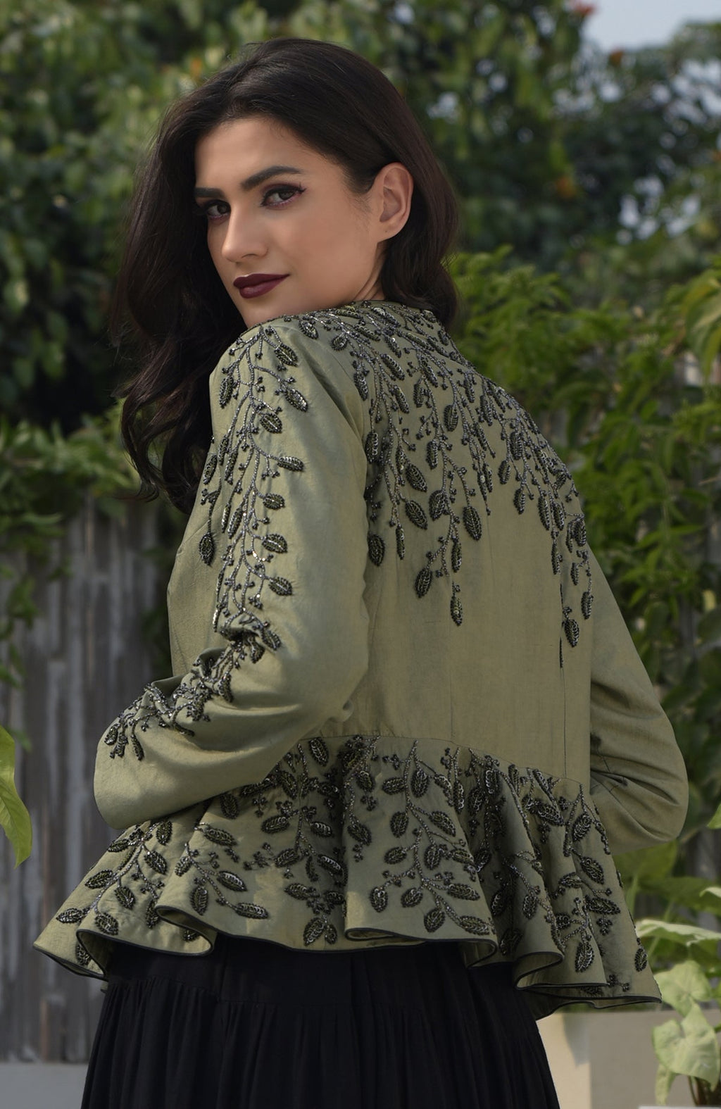 Dark foliage sequin hand embroidered structured peplum jacket.