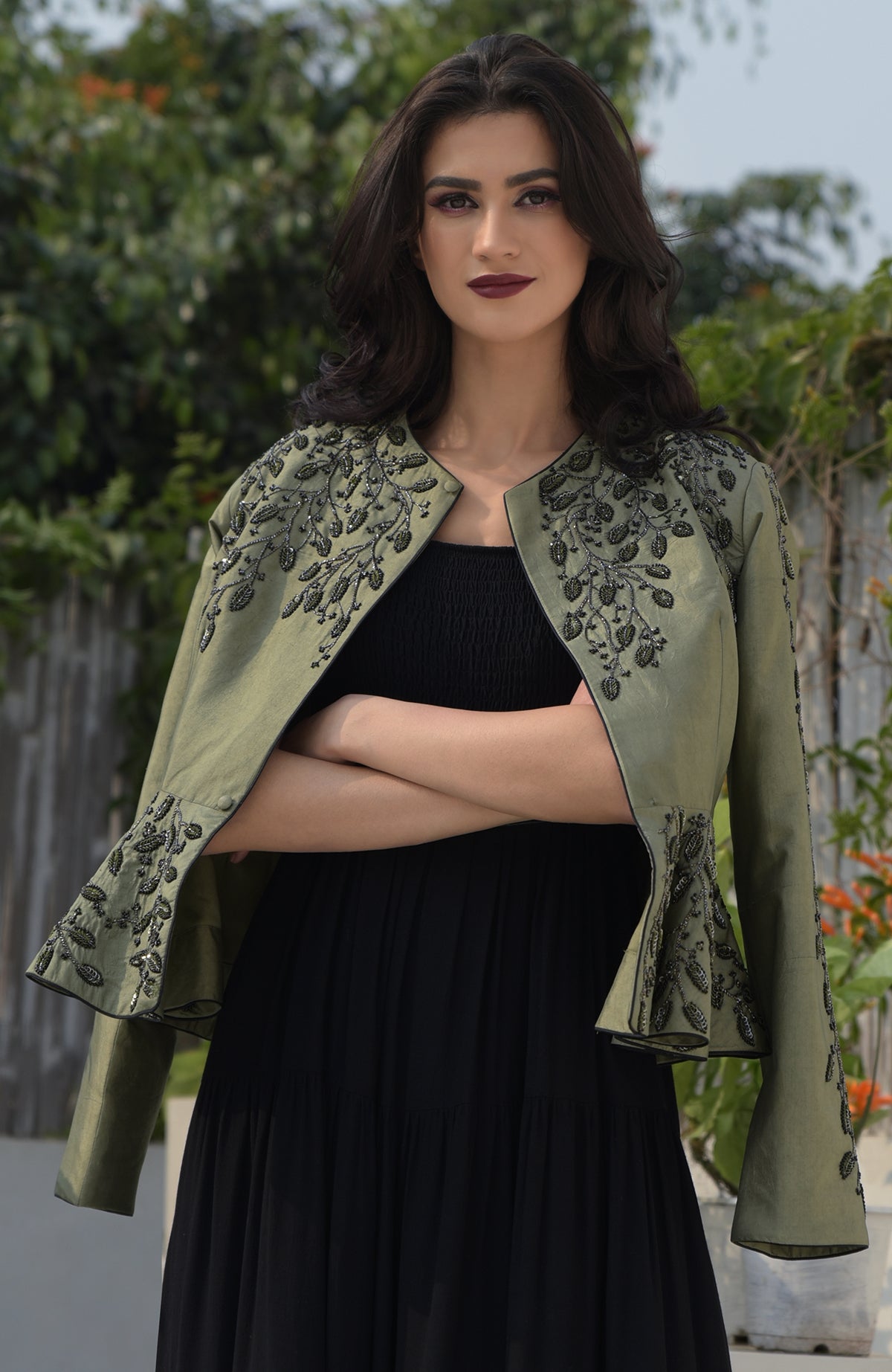 Dark foliage sequin hand-embroidered structured peplum jacket.