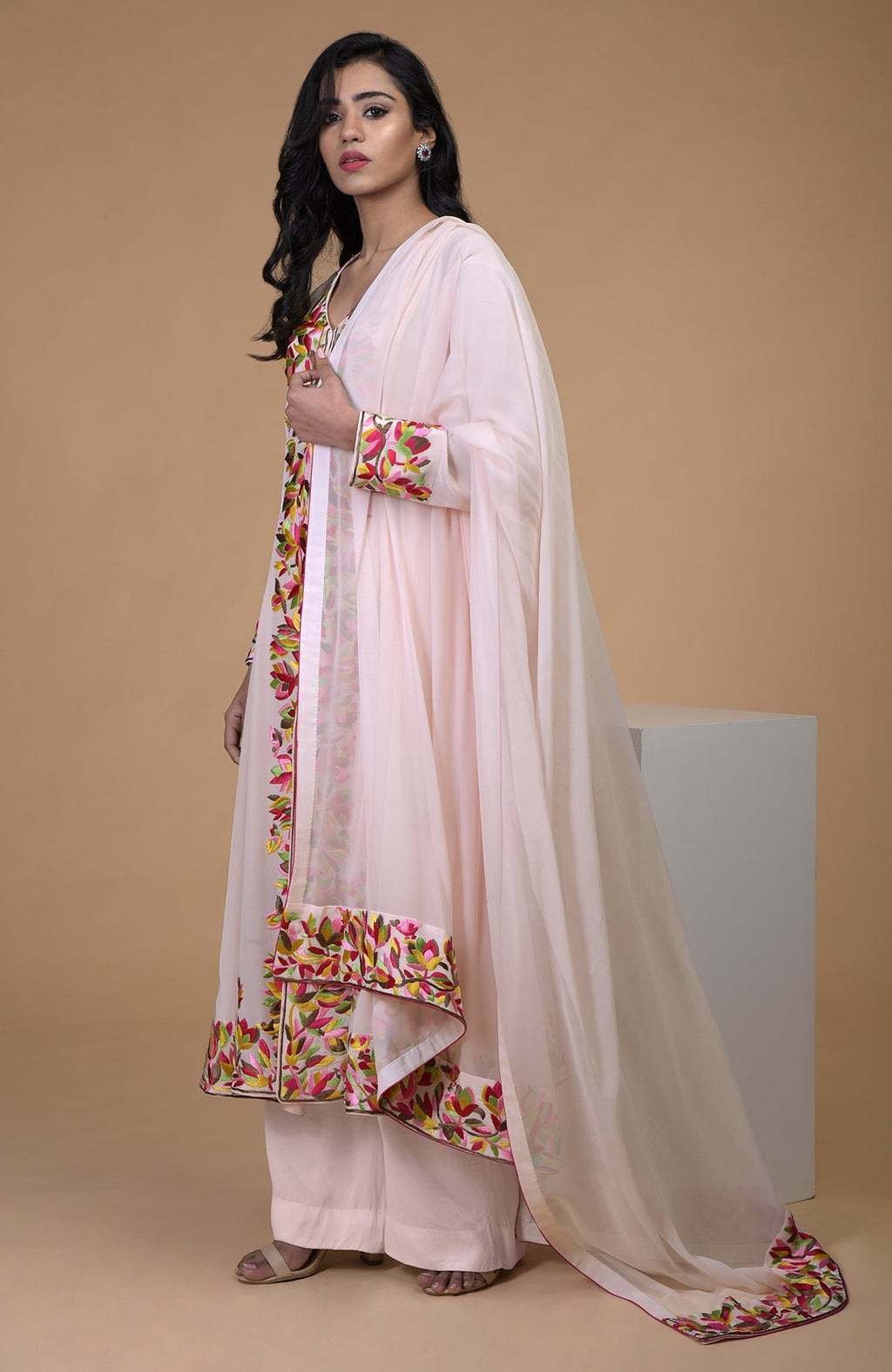 Petal pink kalidaar kurta with multicolor Parsi Gara embroidery and matching wide leg pants.