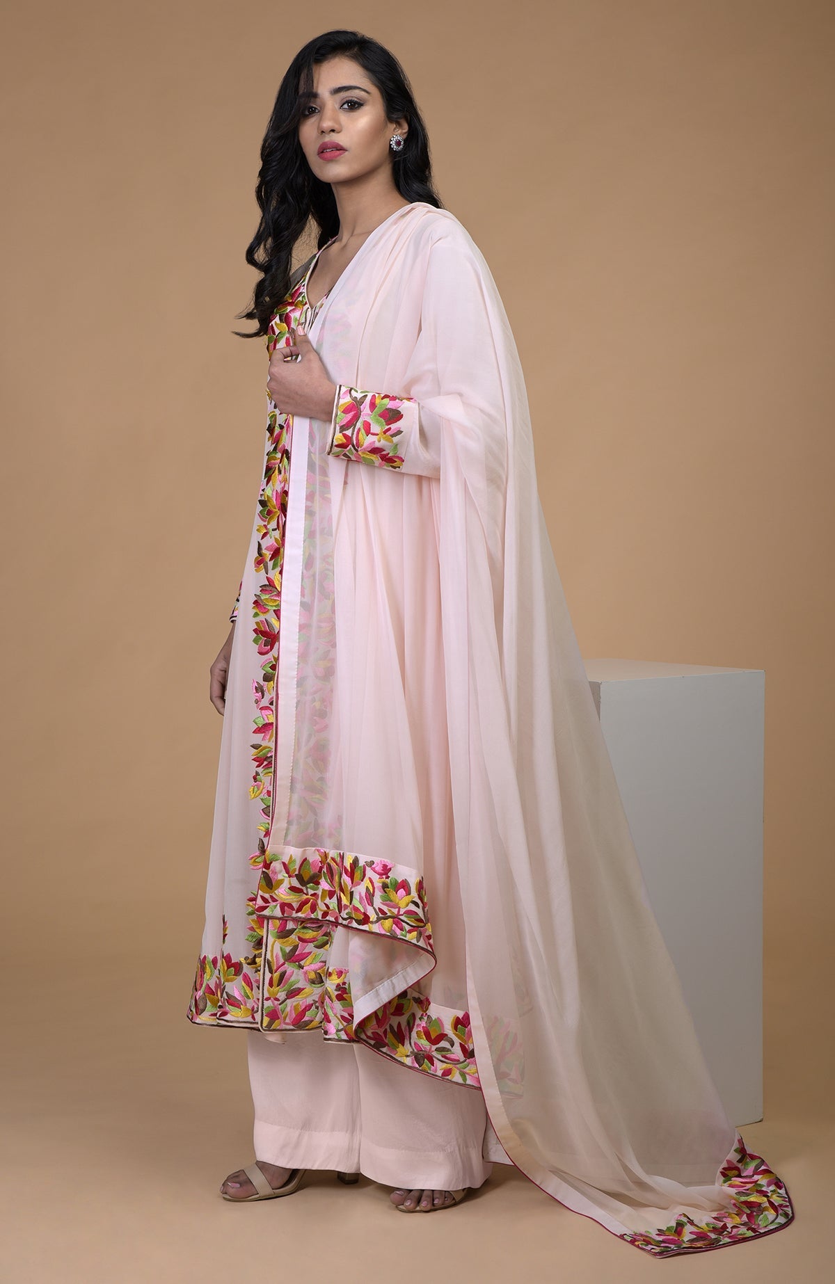 Petal pink kalidaar kurta with multicolor Parsi Gara embroidery and matching wide leg pants.