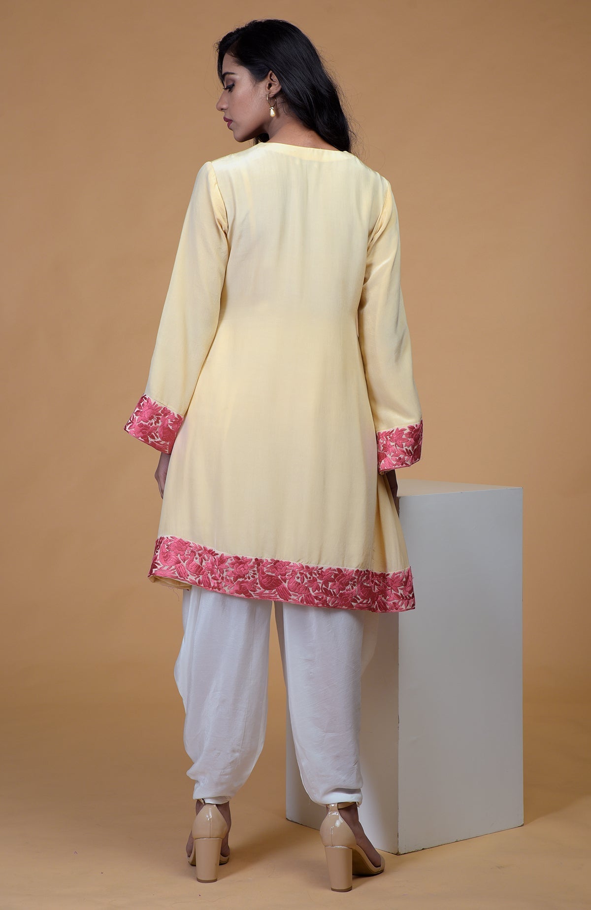 Beige short kurta with rose wine floral parsi gara embroidery and matching beige dhoti pants