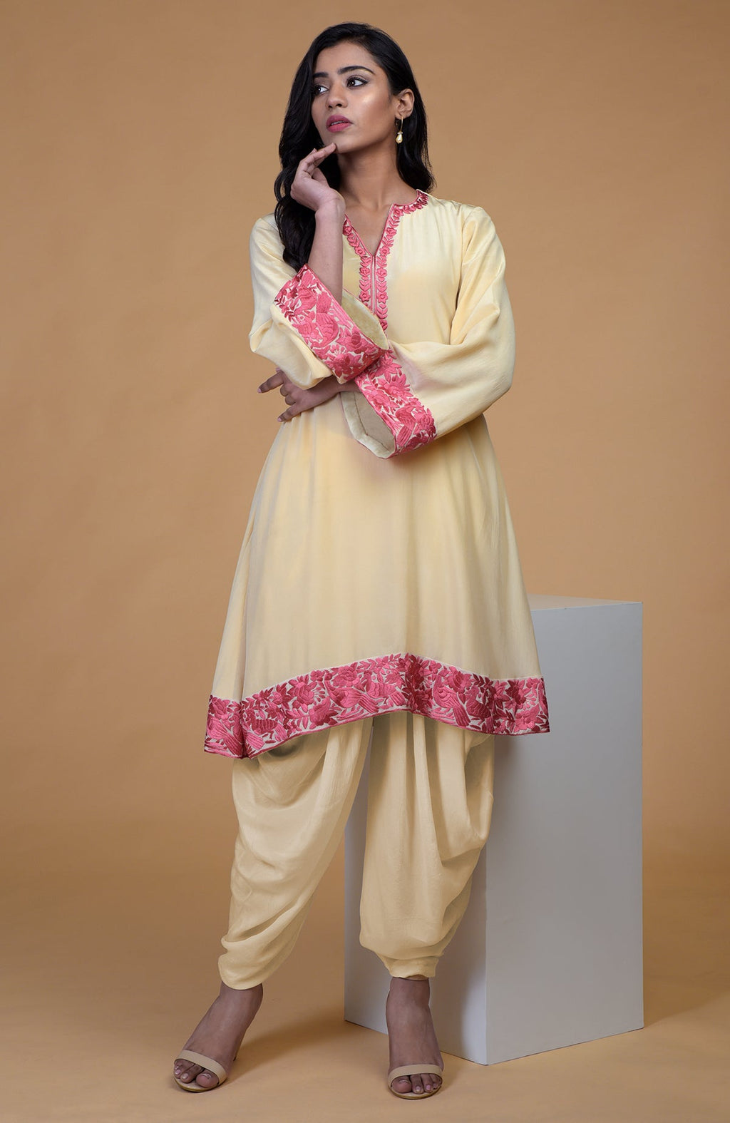 Beige short kurta with rose wine floral parsi gara embroidery and matching beige dhoti pants