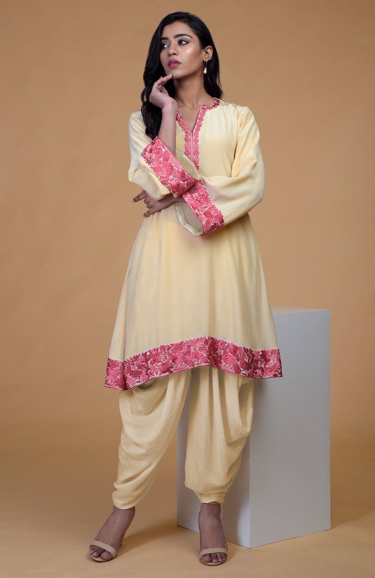 Beige short kurta with rose wine floral parsi gara embroidery and matching beige dhoti pants