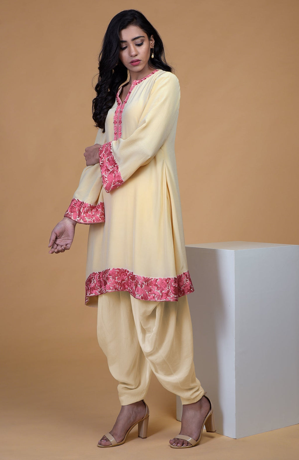 Beige short kurta with rose wine floral parsi gara embroidery and matching beige dhoti pants
