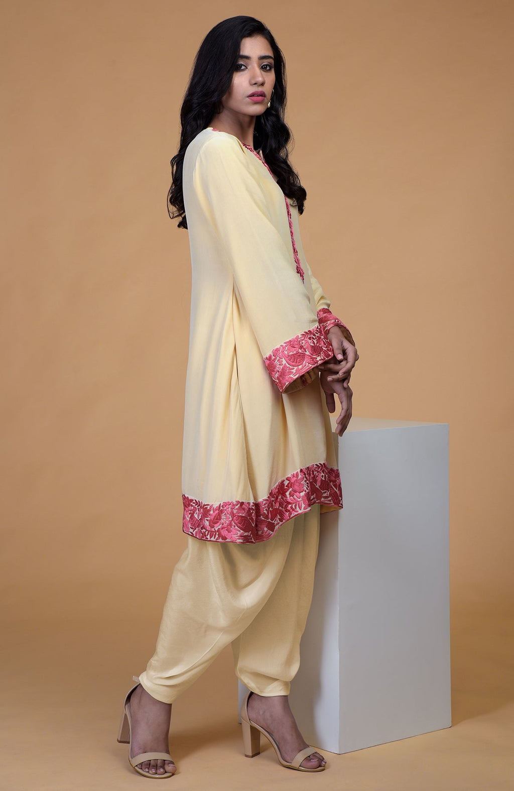 Beige short kurta with rose wine floral parsi gara embroidery and matching beige dhoti pants