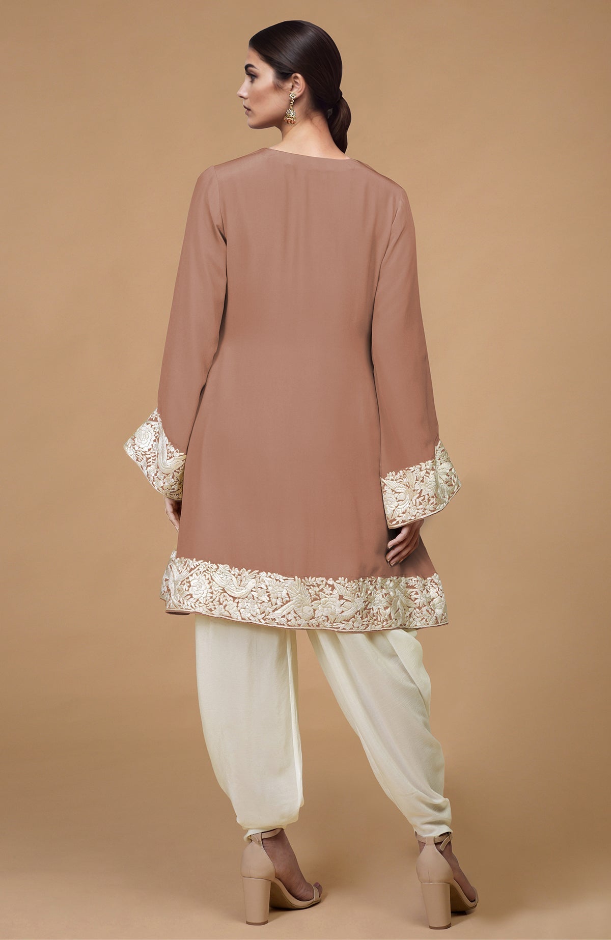 Mocha kurta with ivory Parsi Gara floral embroidery on hem, neckline, and sleeves paired with ivory dhoti pants