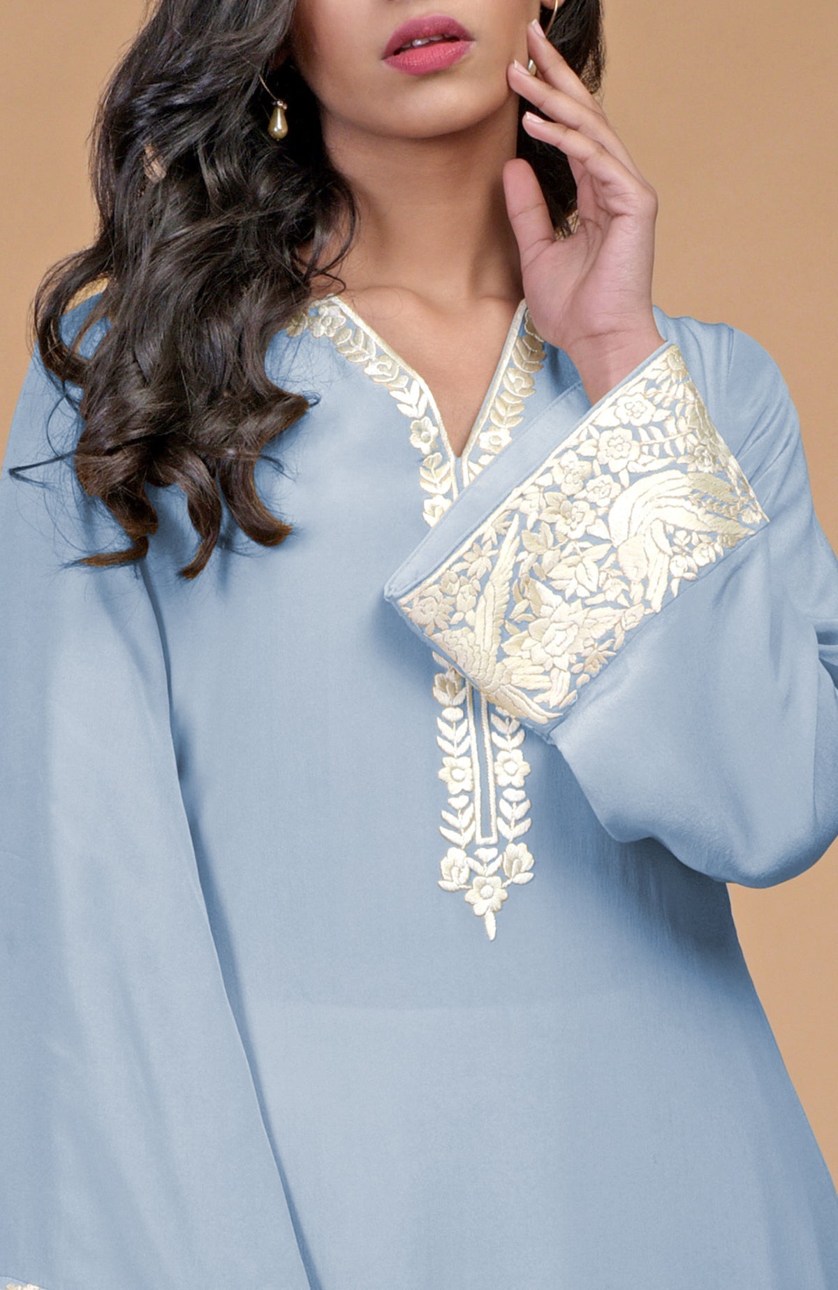 Dusty blue Parsi Gara embroidered Patiala pants suit with intricate floral patterns.