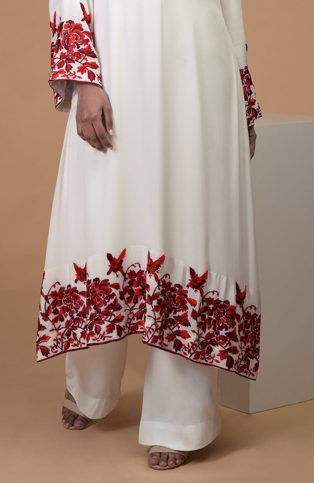 Ivory crepe kurta with red Parsi Gara floral embroidery and bell sleeves paired with wide leg pants