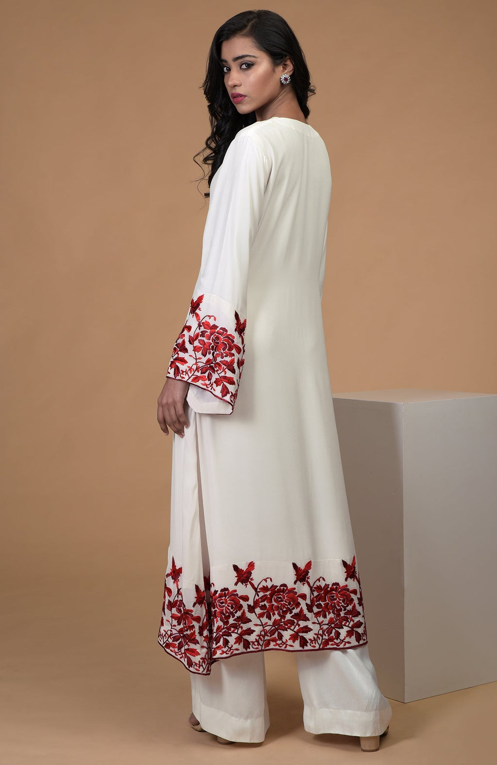Ivory crepe kurta with red Parsi Gara floral embroidery and bell sleeves paired with wide leg pants