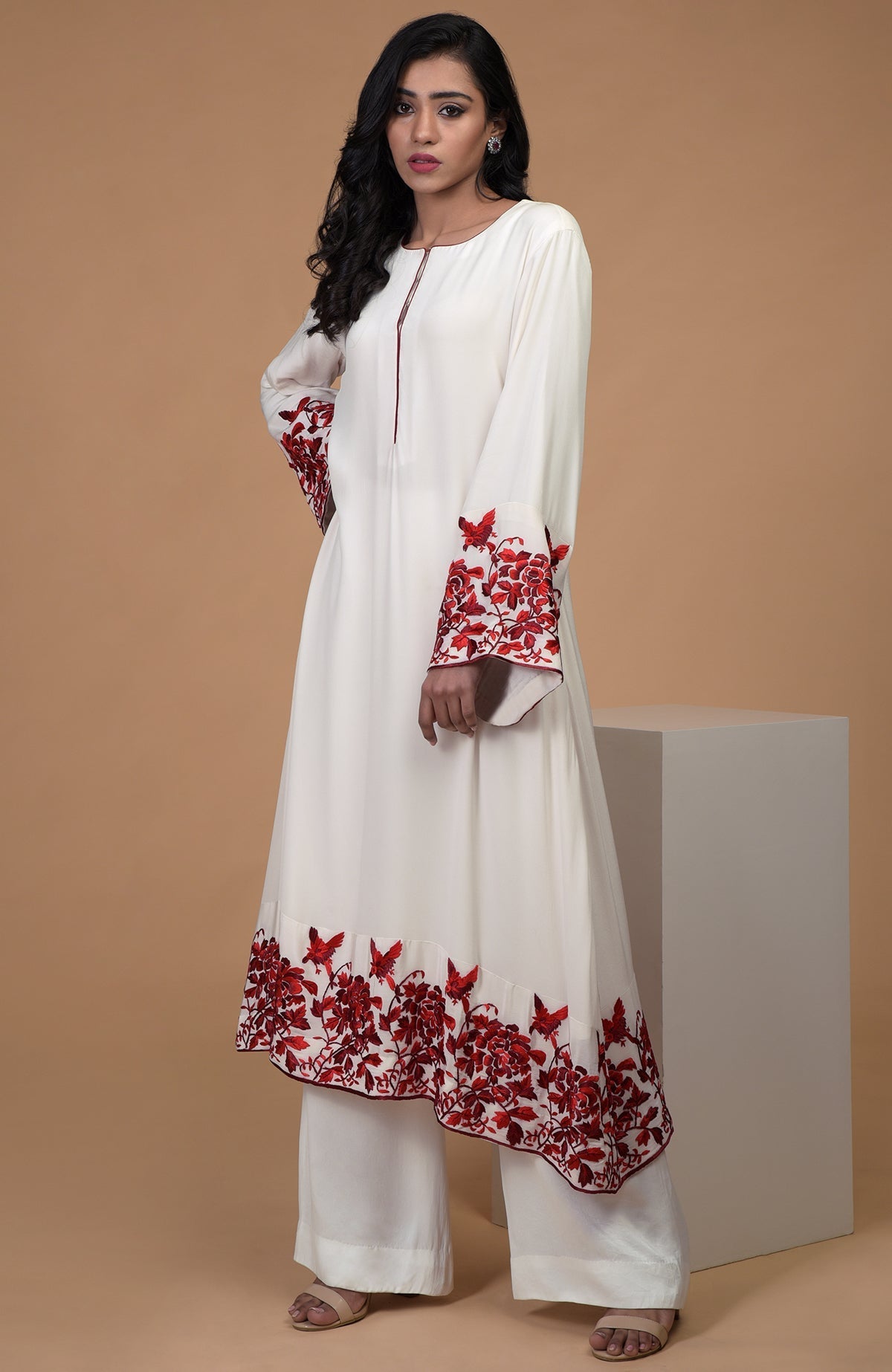 Ivory crepe kurta with red Parsi Gara floral embroidery and bell sleeves paired with wide leg pants