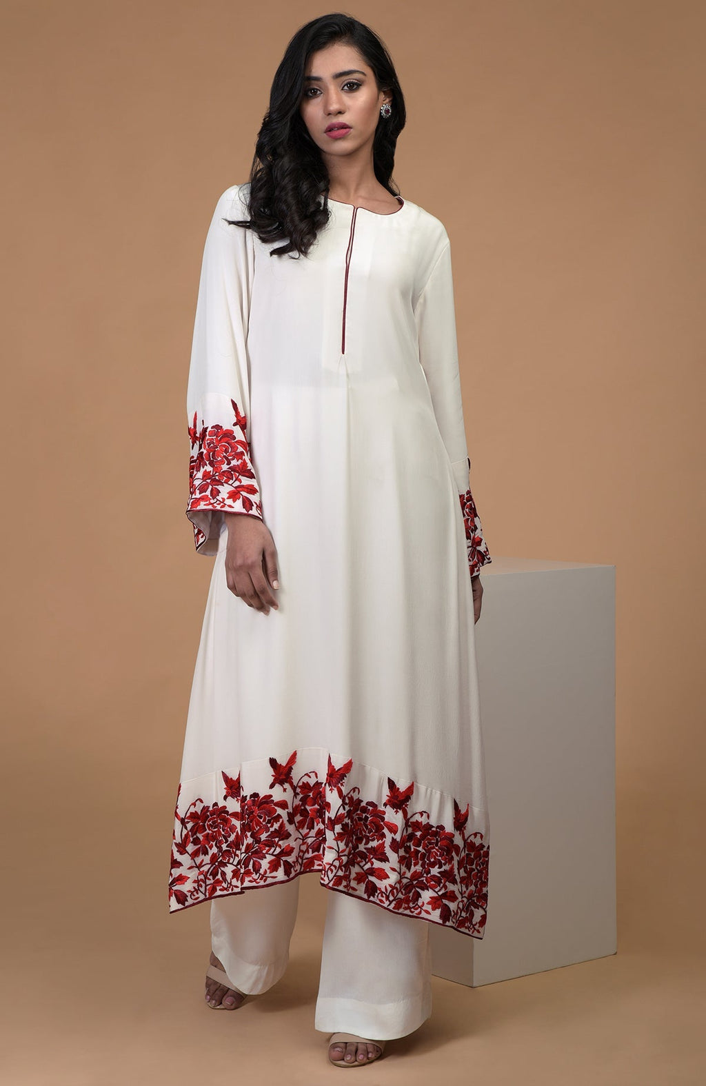 Ivory crepe kurta with red Parsi Gara floral embroidery and bell sleeves paired with wide leg pants