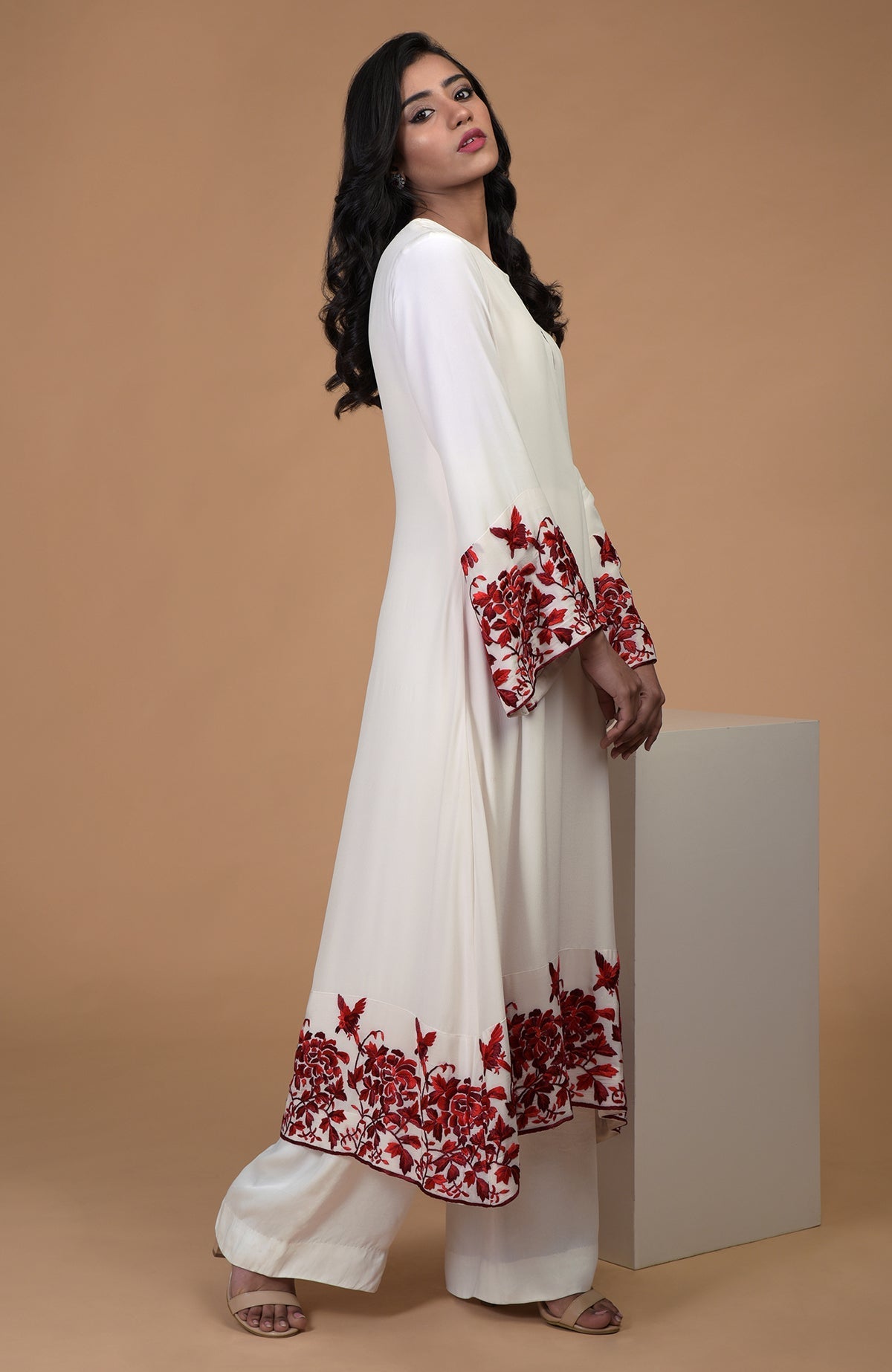 Ivory crepe kurta with red Parsi Gara floral embroidery and bell sleeves paired with wide leg pants