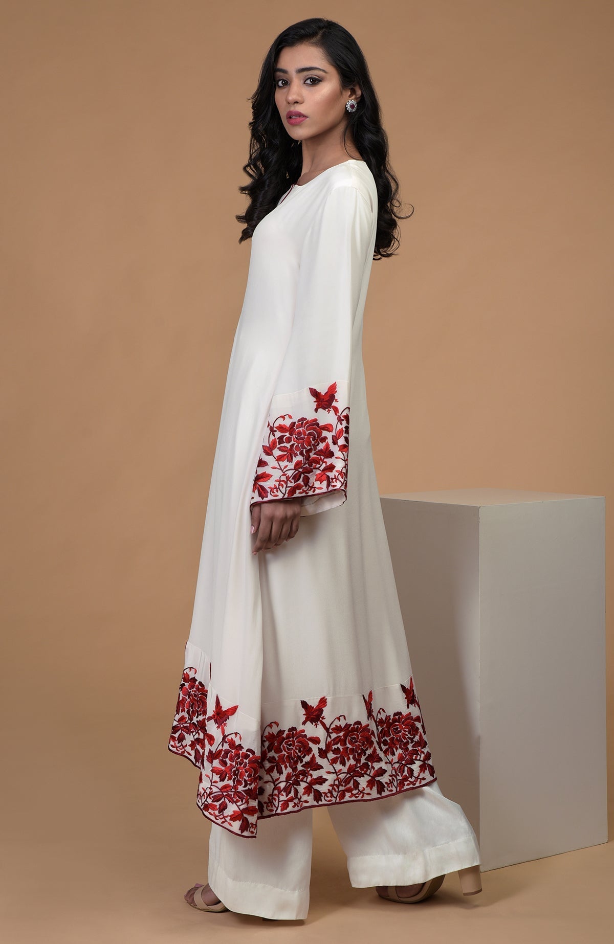 Ivory crepe kurta with red Parsi Gara floral embroidery and bell sleeves paired with wide leg pants