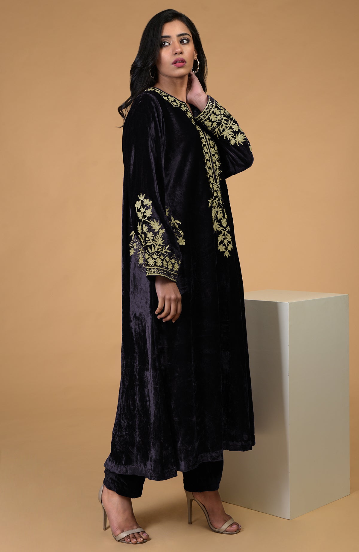Eclipse blue silk velvet kurta with gold Kashmiri tilla aari embroidery and matching pants.