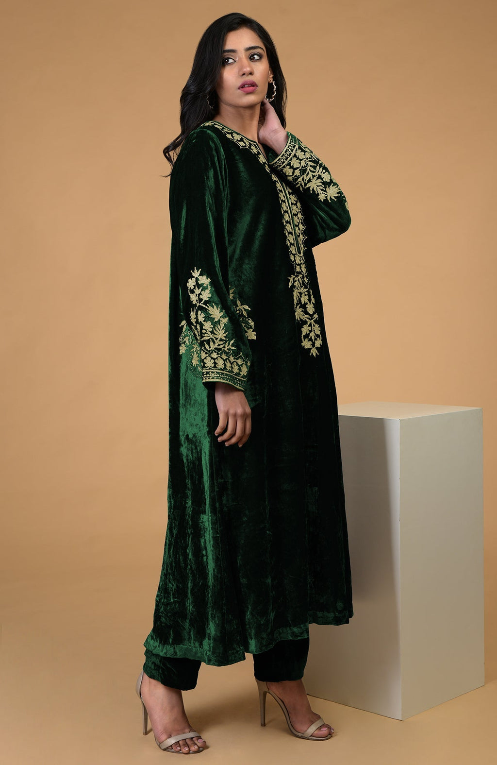 Emerald green silk velvet kurta with gold Kashmiri tilla aari embroidery and matching pants