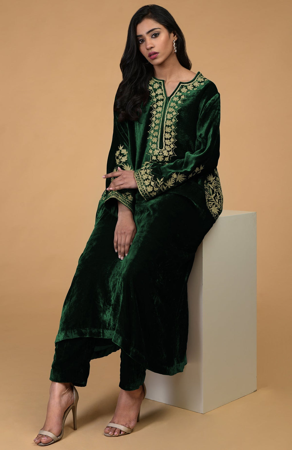 Emerald green silk velvet kurta set with Kashmiri gold tilla aari embroidery and matching pants