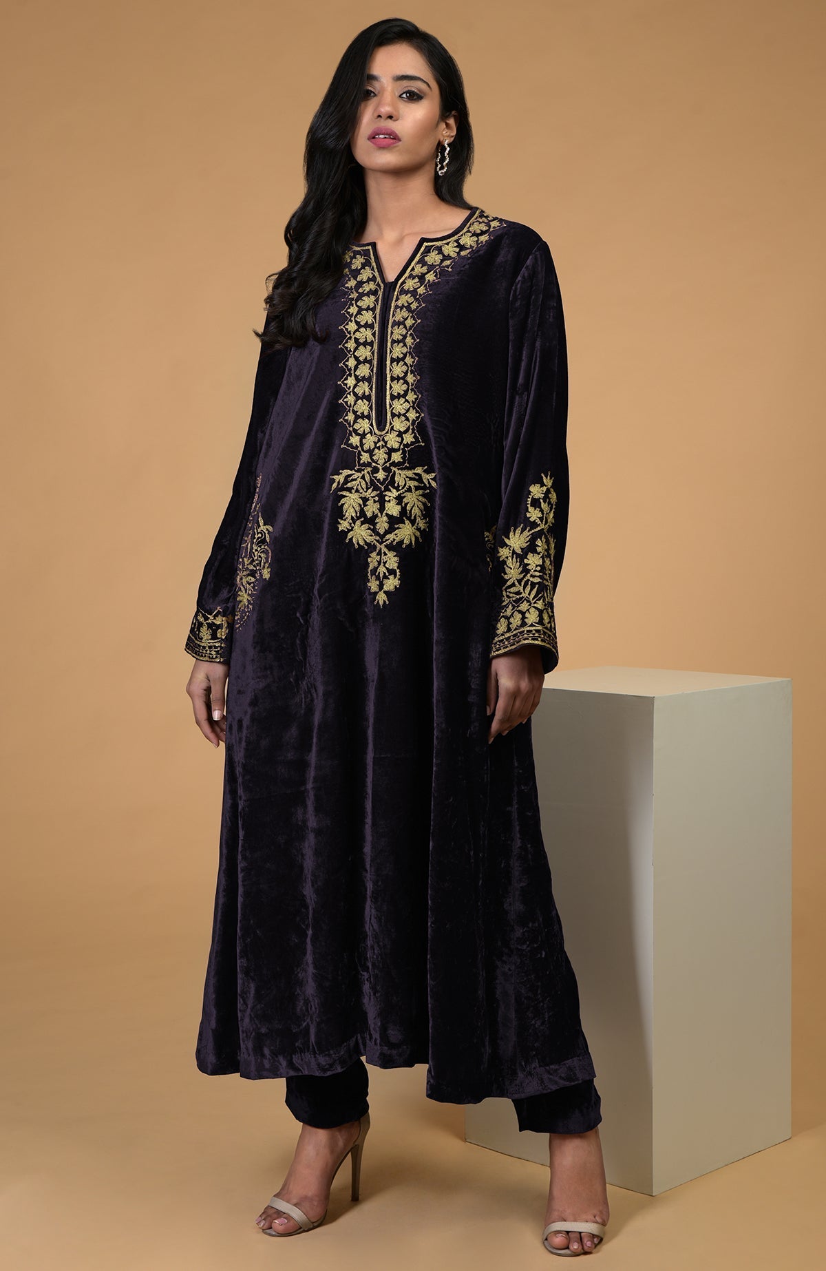 Emerald green silk velvet kurta with gold Kashmiri tilla aari embroidery and matching pants