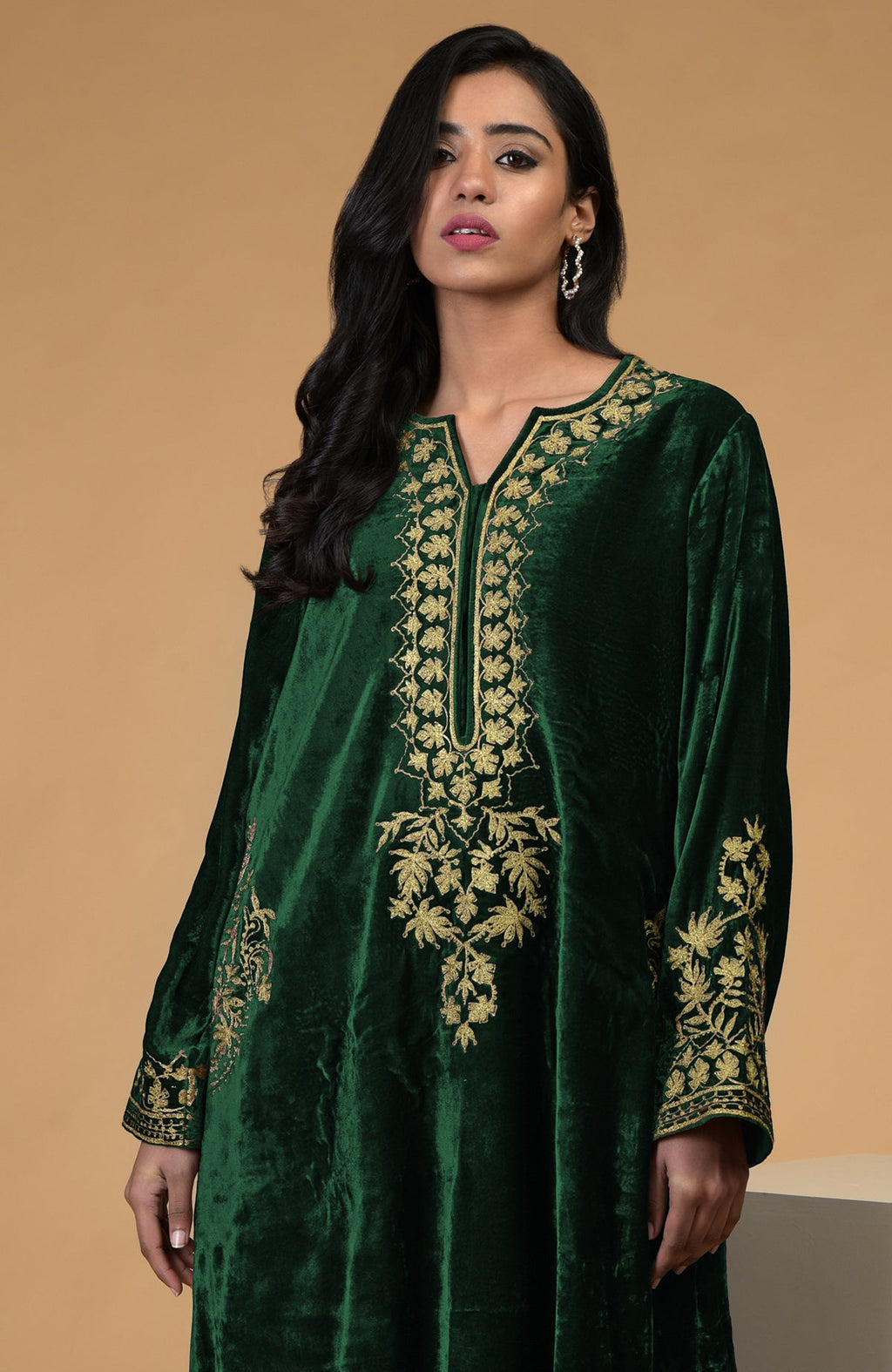 Emerald green silk velvet kurta with gold Kashmiri tilla aari embroidery and matching pants