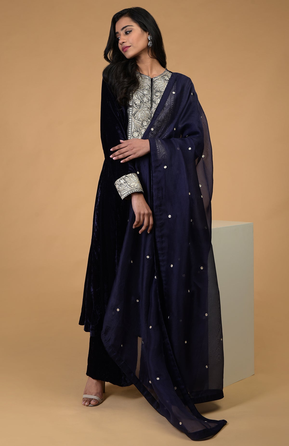Midnight blue velvet kurta set with silver Kashmiri tilla embroidery and organza dupatta.