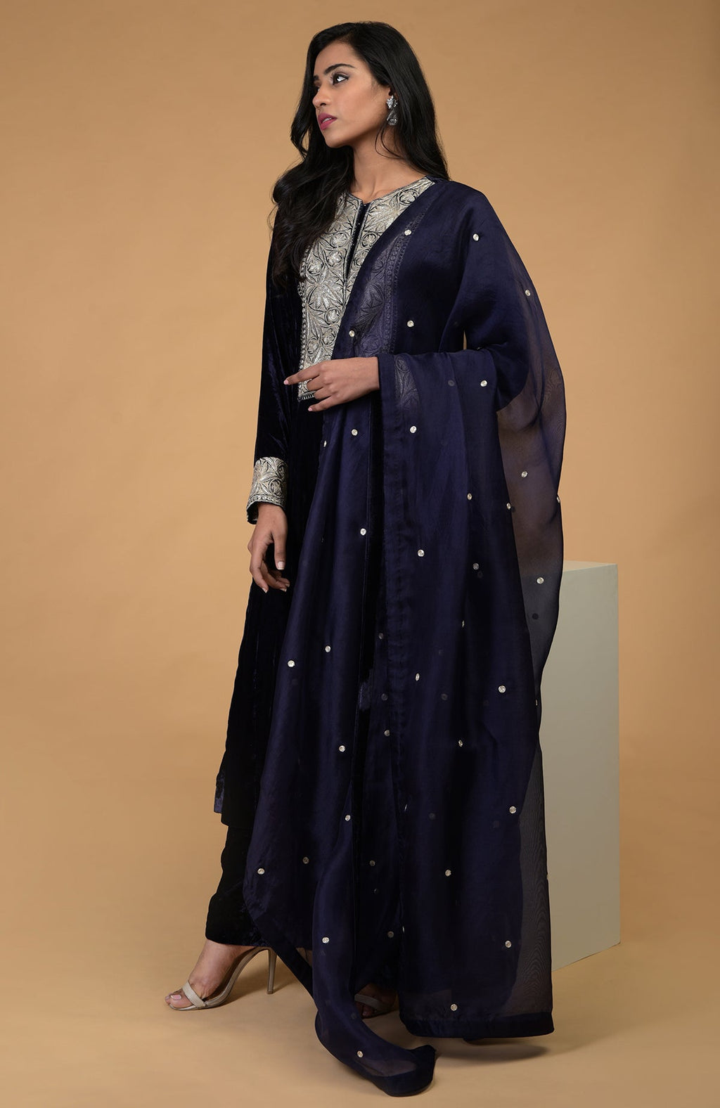 Midnight blue velvet kurta set with silver Kashmiri tilla embroidery and organza dupatta.