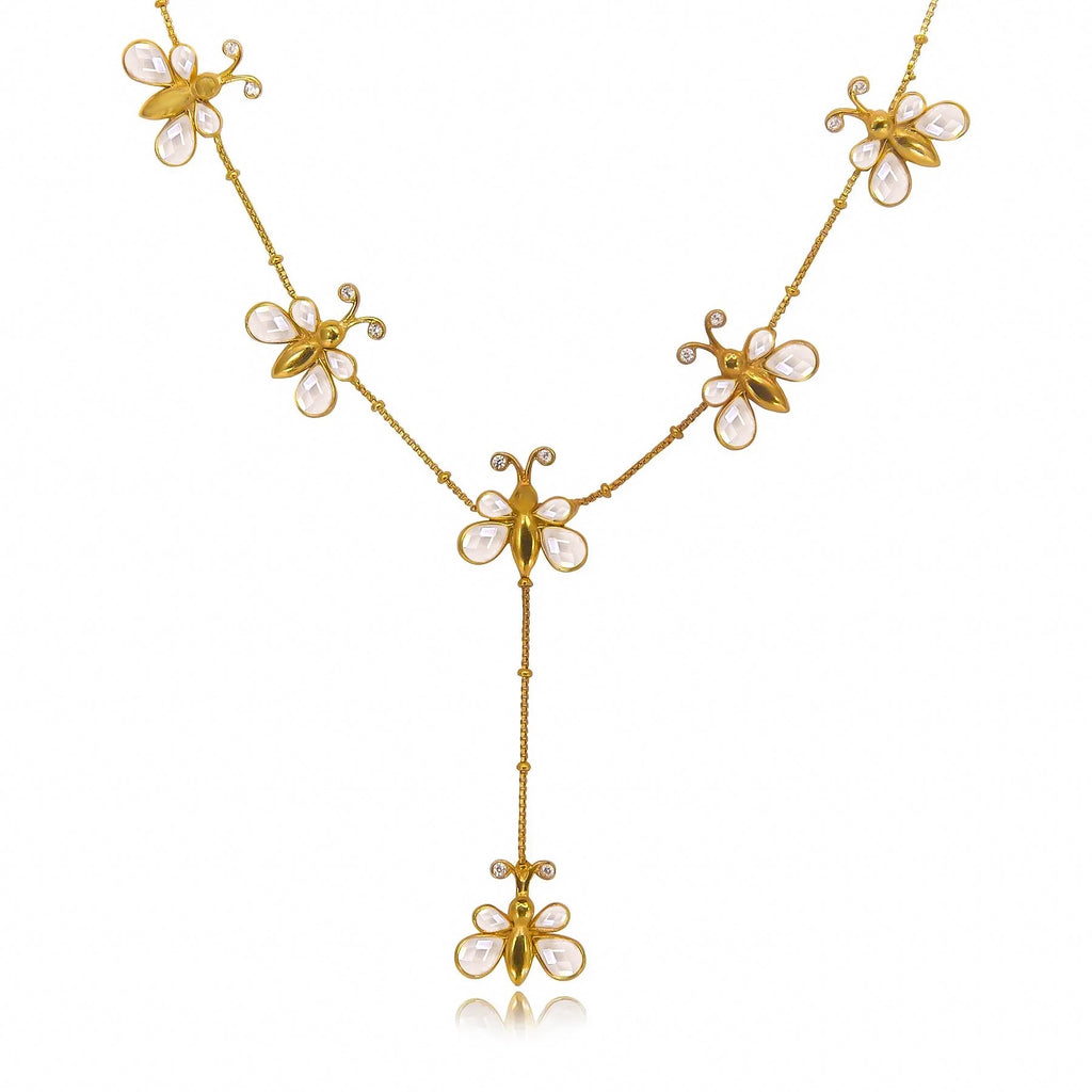 Unniyarcha earring set displayed on a white background, showcasing a traditional yet minimalist handcrafted silver design