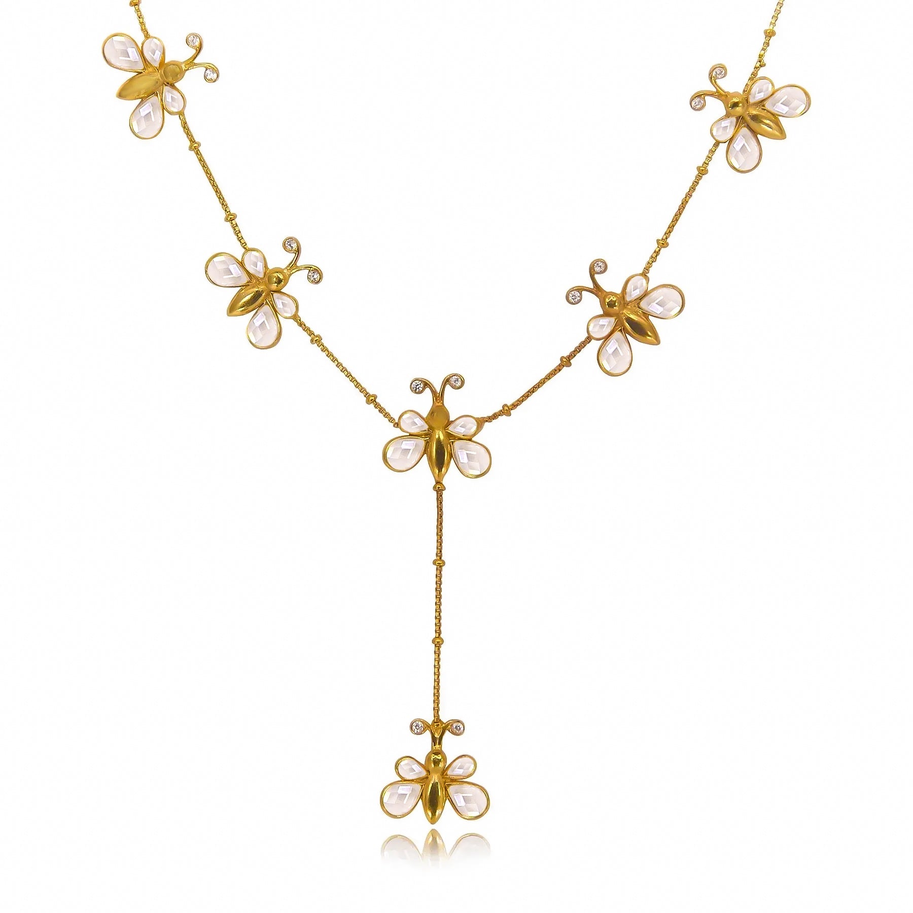 Unniyarcha earring set displayed on a white background, showcasing a traditional yet minimalist handcrafted silver design