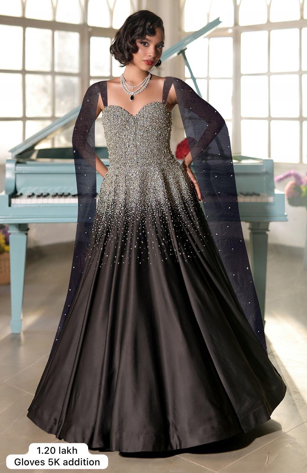 Black satin princess gown with crystal and pearl bead embroidery and a voluminous skirt