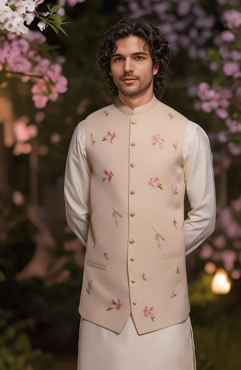 Ivory straight-cut kurta with full sleeves and tapered trousers paired with cream floral embroidered bandi jacket